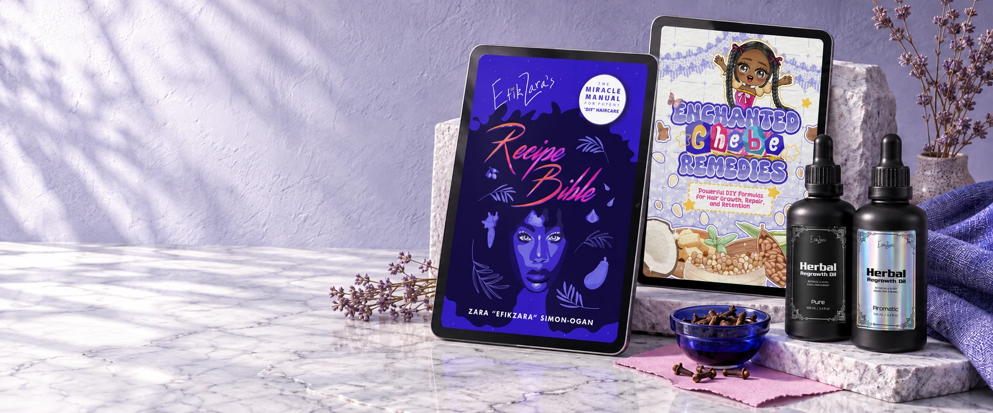 EfikZara’s Recipe Bible and Enchanted Chebe Remedies on iPads, with Pure and Aromatic Herbal Regrowth Oil, blue glass, lilac linen and tactile stone.